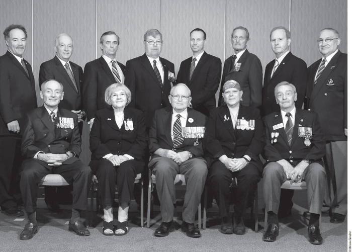 Advisory Committee: Back row: John Walker, Al DeQuetteville, Pat Stogran, Gordon Strathy, Thomas J. Hoppe, Lorne Edward Hall, Brian Forbes, Claude Petit
  Front row: Larry Murray (Chair), Barbara Grimster, John Gardam, Louise Richard, W. Bruce Ferguson
  Missing: Thomas G. White, Charles H. Belzile, Gibson Glavin, Fred Mombourquette, Claudia Schibler