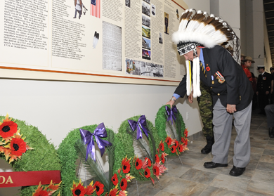 Chief Lawrence Paul, Millbrook First Nation (Truro), Nova Scotia lays a wreath during a Remembrance Ritual after an unveiling ceremony of a Mi’kmaq Veteran Wall of Honour at the Glooscap Heritage Centre, Millbrook First Nation